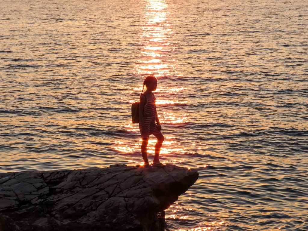 silhouette of girl in the sunset
